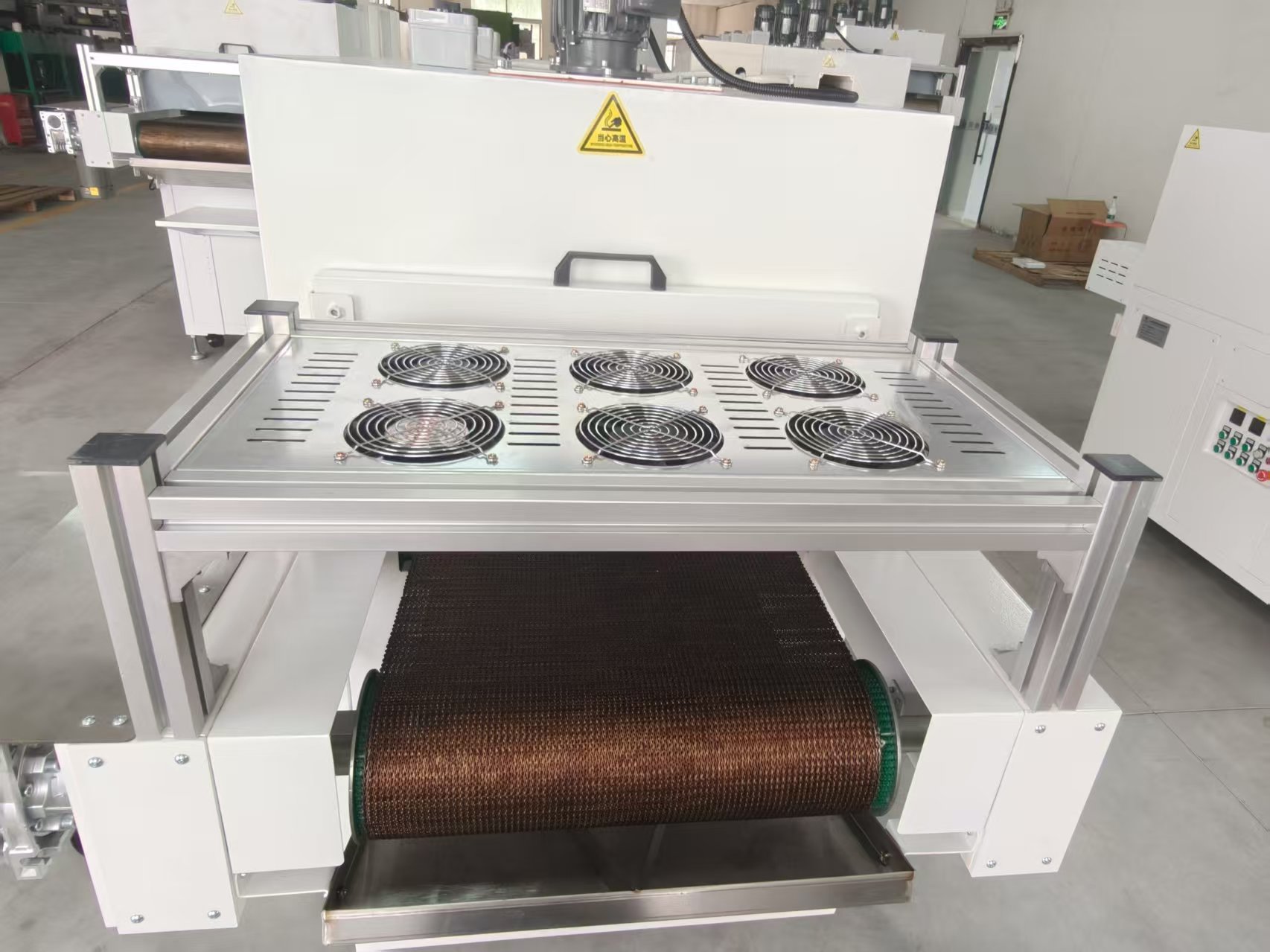 套膜收缩隧道炉冷却段设计不合理导致产品变形